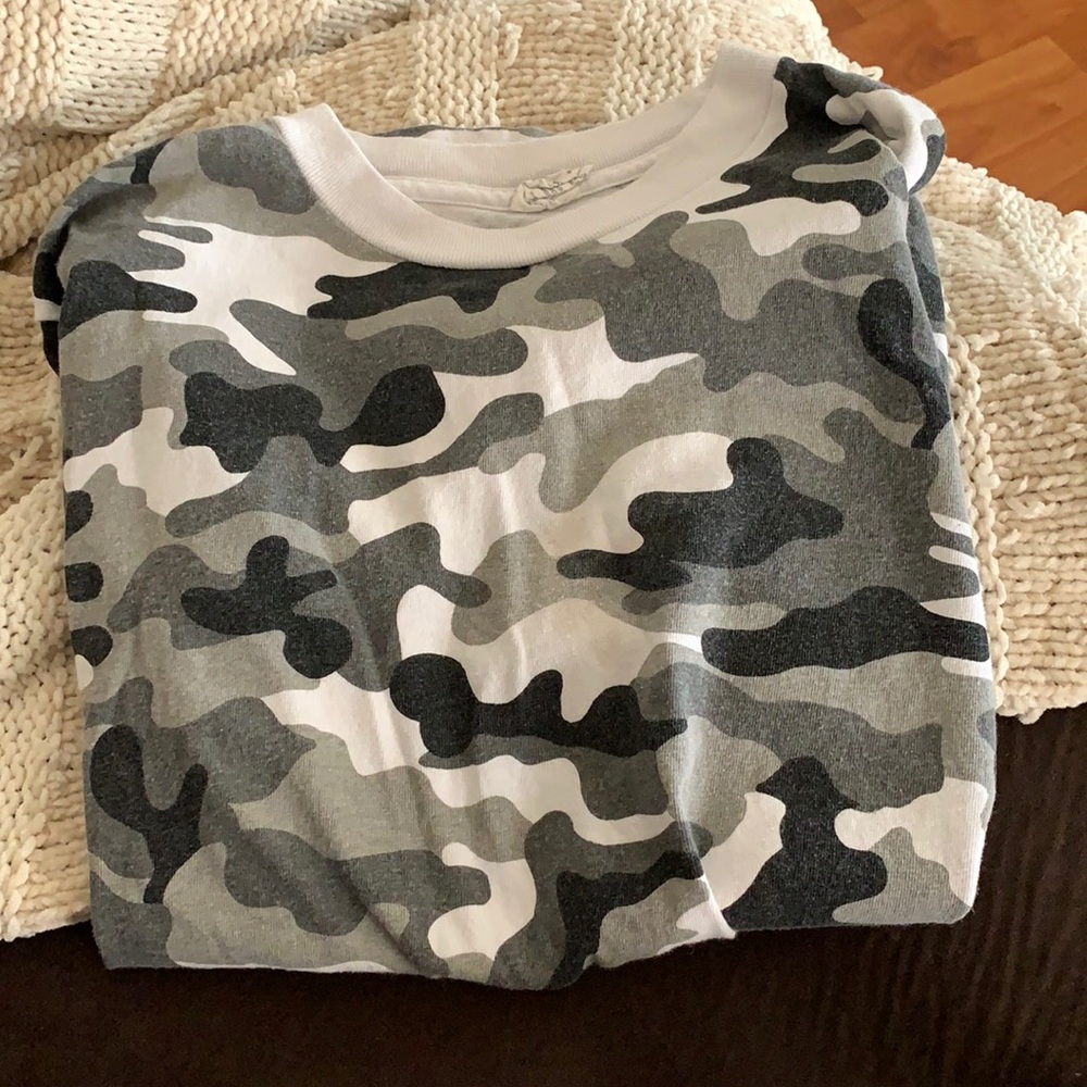 An over sized t-shirt, black, grey and white camo.